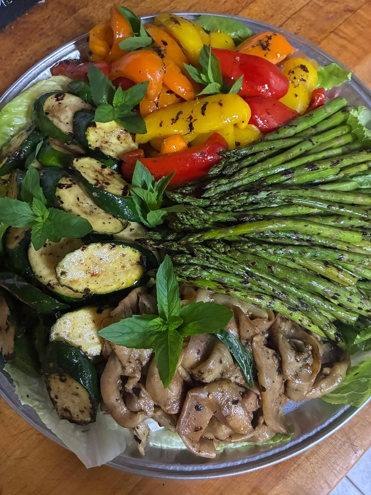 Grilled vegetable catering platter — peppers, asparagus, zucchini and mushrooms